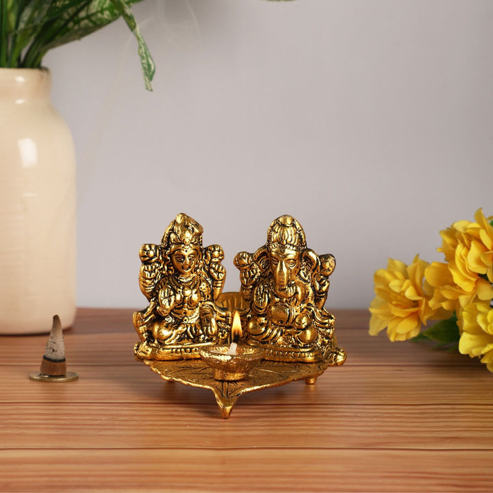 Handmade Lakshmi & Ganesh On Leaf Metal Oil Lamp / Diya