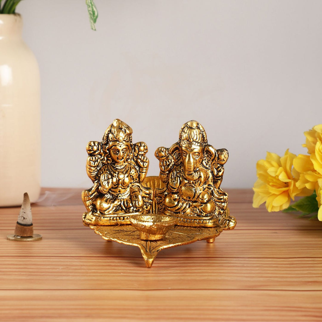Handmade Lakshmi & Ganesh On Leaf Metal Oil Lamp / Diya
