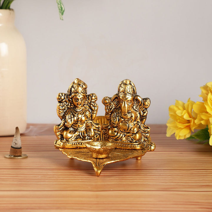 Handmade Lakshmi & Ganesh On Leaf Metal Oil Lamp / Diya