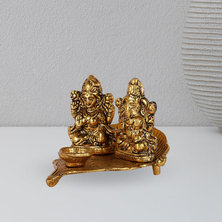 Handmade Lakshmi & Ganesh On Leaf Metal Oil Lamp / Diya
