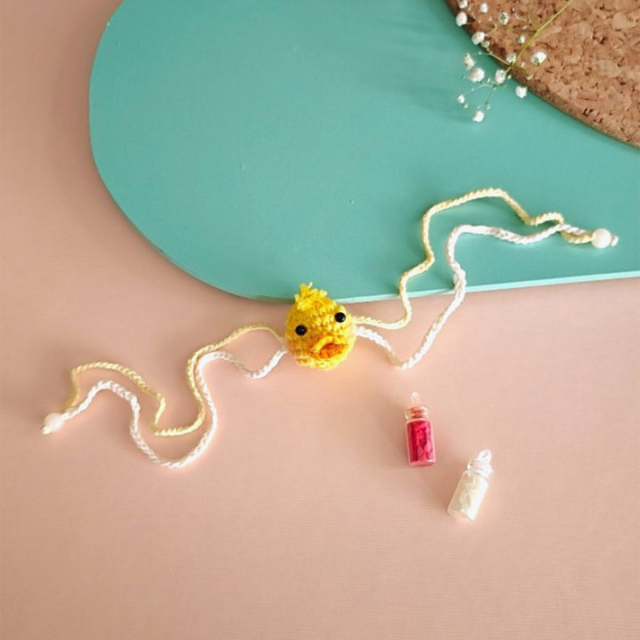 Handmade Crochet Doodling Duck Rakhi For Newborns With Roli Chawal