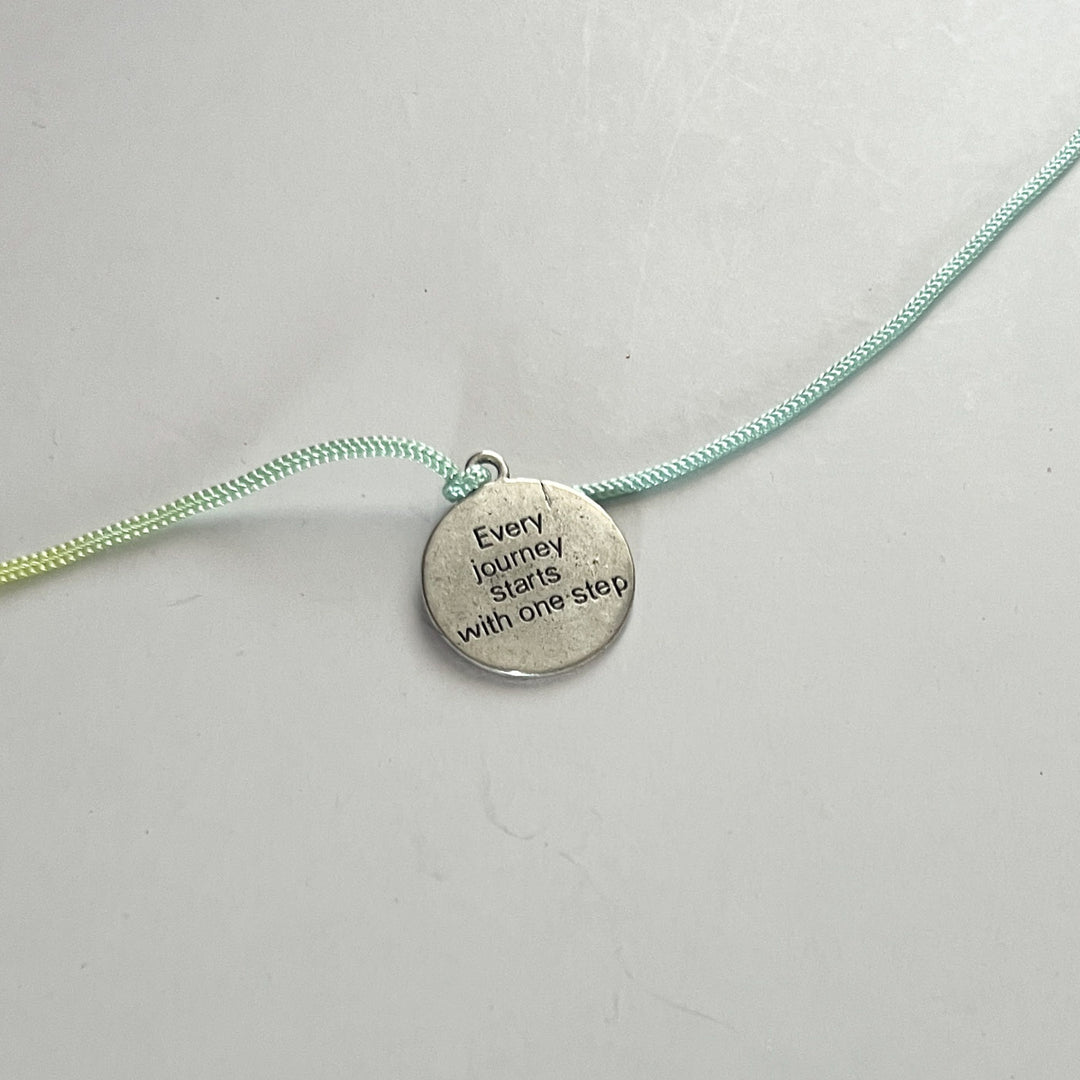 Engraved "Every Journey Starts With One Step" Quote Metal Charm Rakhi With Roli Chawal for Brother
