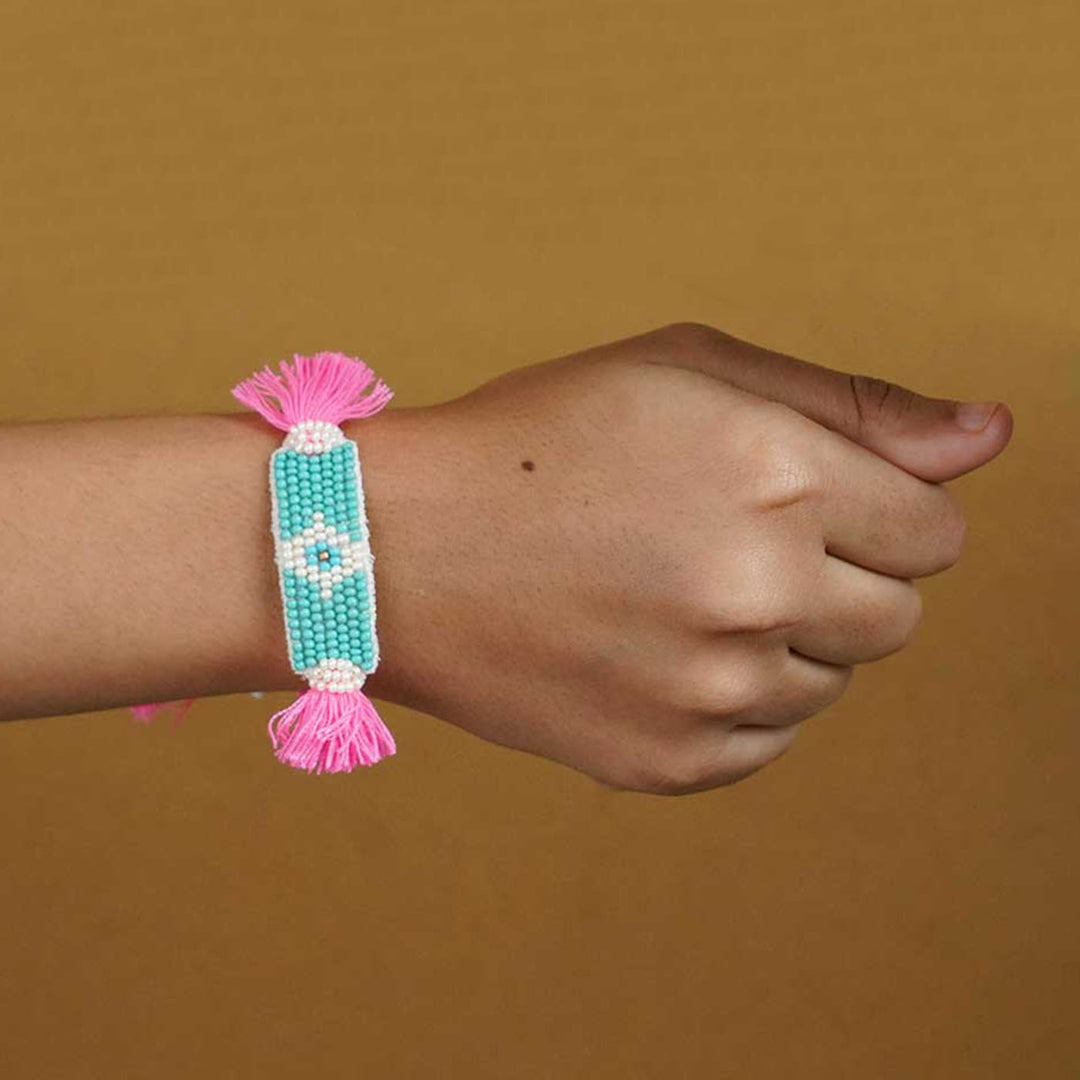Reusable Beaded Evil Eye Lumba Rakhi For Bhabhi With Roli Chawal - Worn on wrist display