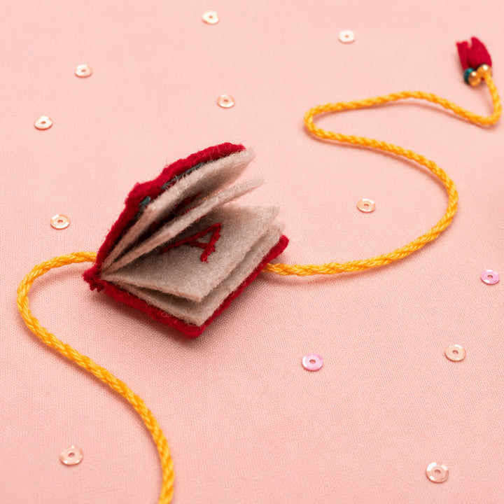 Hand Embroidered Book Rakhi With Keychain For Brother