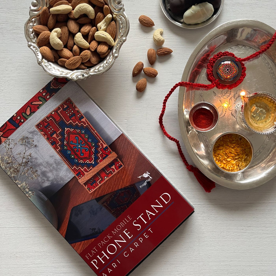 Handcrafted Crochet Folk Art Rakhi Hamper With Rice Roli Haldi - Product in Decorative Flatlay