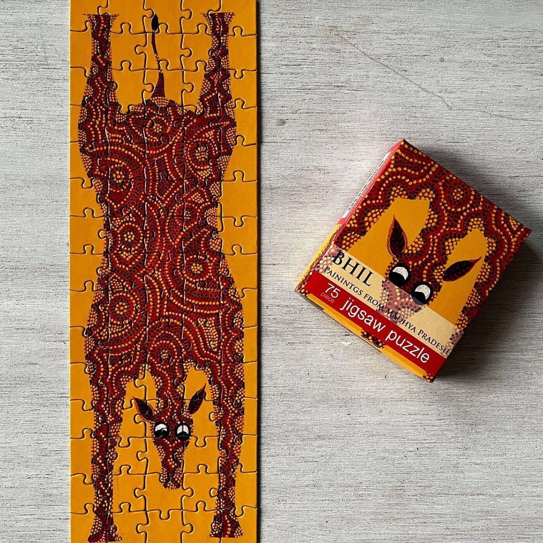 Handcrafted Folk Art Rakhi Hamper For Kids With Rice Roli Haldi 1 - Partially Completed Puzzle Next To Box