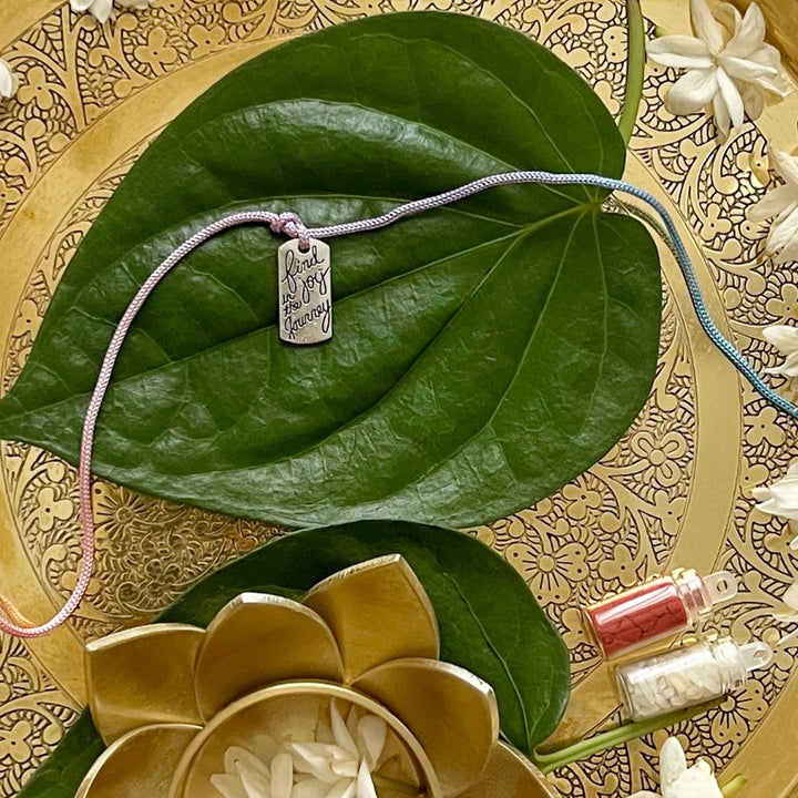Engraved "Find Joy in the Journey" Quote Metal Charm Rakhi With Roli Chawal for Brother
