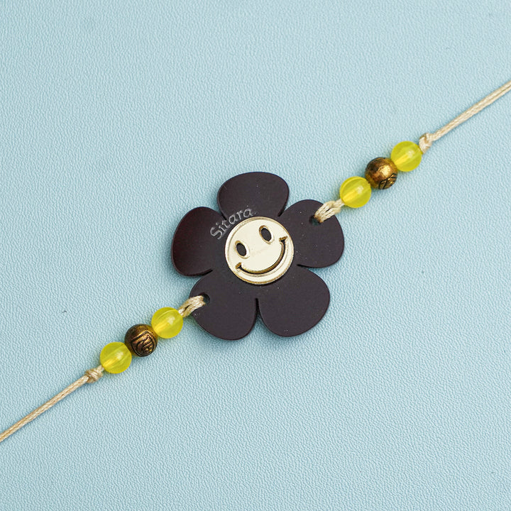 Personalized Handmade Flower Smiley Acrylic Kids Rakhi With Roli Chawal - Close-up Front View (5)