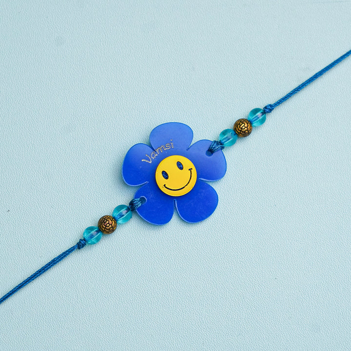 Personalized Handmade Flower Smiley Acrylic Kids Rakhi With Roli Chawal - Close-up Front View