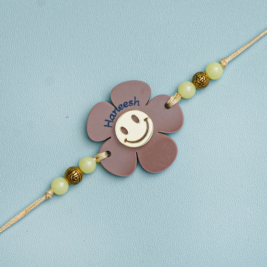 Personalized Handmade Flower Smiley Acrylic Kids Rakhi With Roli Chawal - Close-up Front View (3)