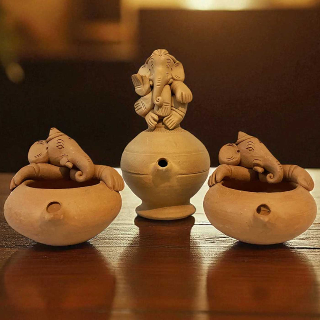Handmade Ganesh Design Terracotta Oil Lamp / Diya | Includes 1 Magic Diya And 2 Diyas