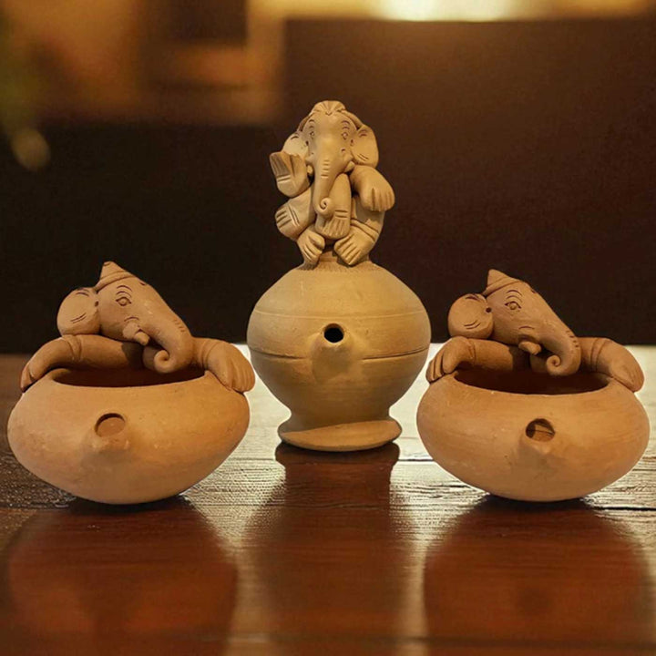 Handmade Ganesh Design Terracotta Oil Lamp / Diya | Includes 1 Magic Diya And 2 Diyas