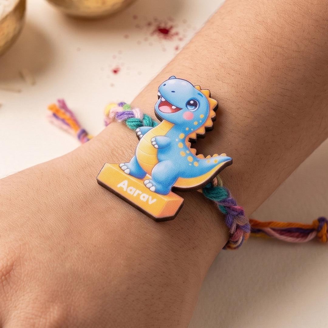 Personalized Reusable Blue Dino MDF Wood Rakhi With Roli Chawal