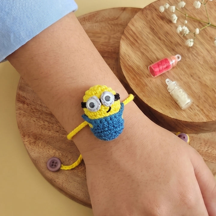 Handmade Crochet Mischievous Minions Rakhi For Boys With Roli Chawal