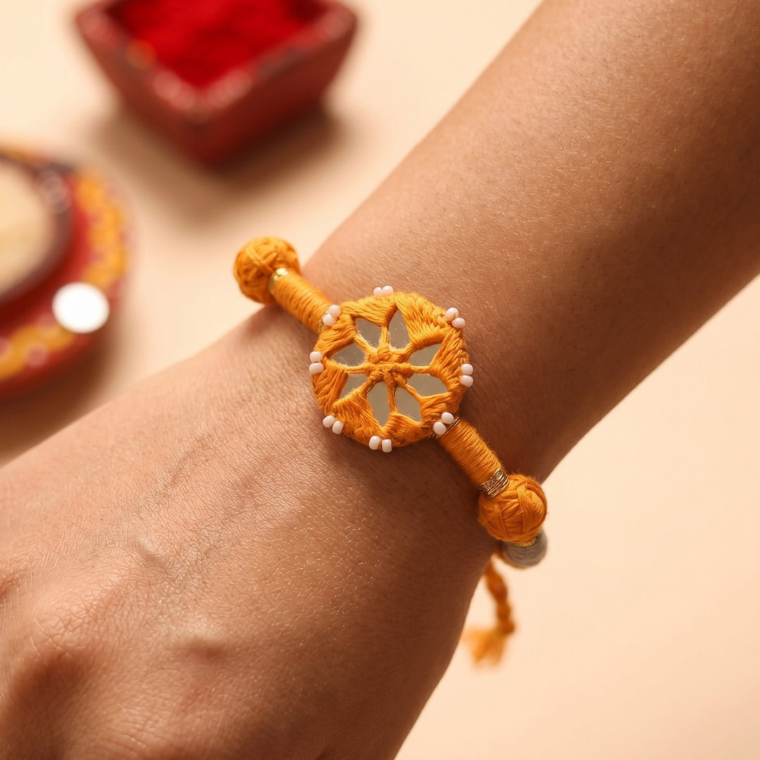 Handmade Mirror Work Patwa Ochre Cotton Rakhi With Roli Chawal