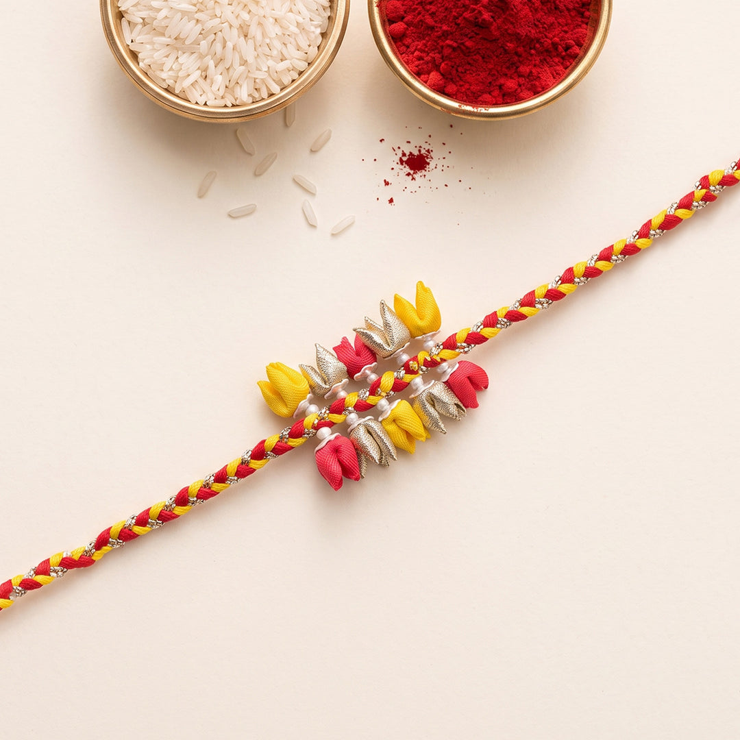 Handcrafted Dual-Tier Tulip Bud & Pearl Silk Rakhi For Brother With Roli Chawal