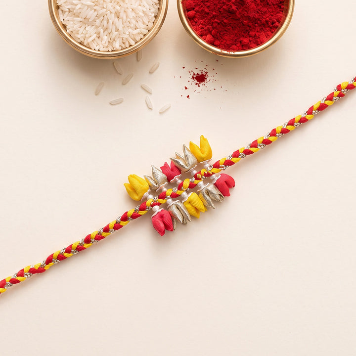 Handcrafted Dual-Tier Tulip Bud & Pearl Silk Rakhi For Brother With Roli Chawal