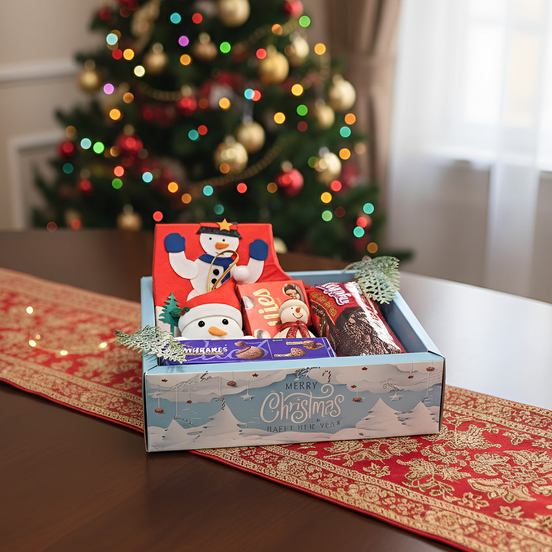 Personalized Christmas Gift Hamper | Includes 1 Ornament, 1 Stocking, 1 Snowman Candle, 1 Brownie Cake, 1 Cadbury Chocobakes, 1 Nutties Pack