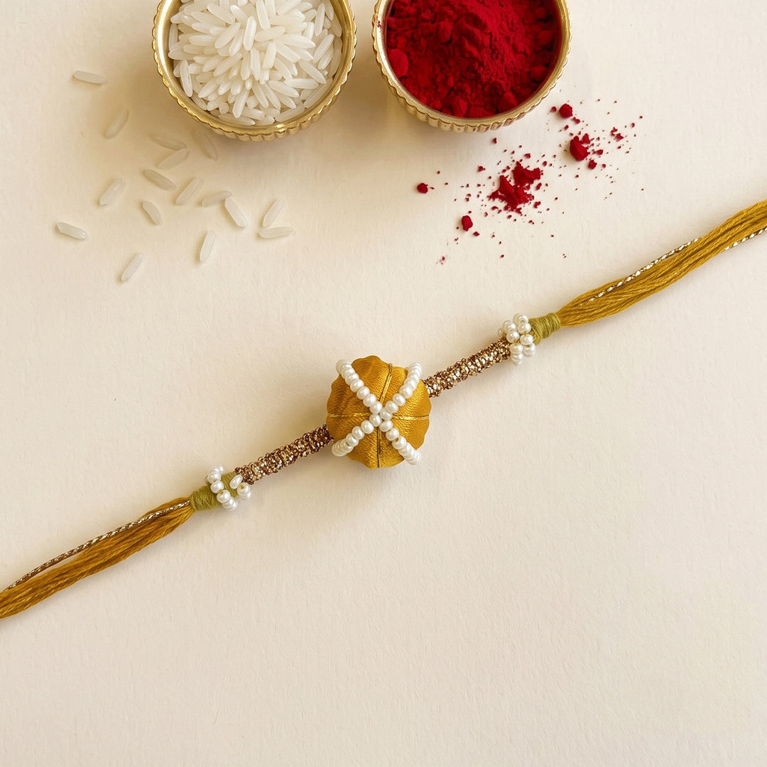 Handmade Silk-Wrapped Bead & Pearl Rakhi For Brother With Roli Chawal
