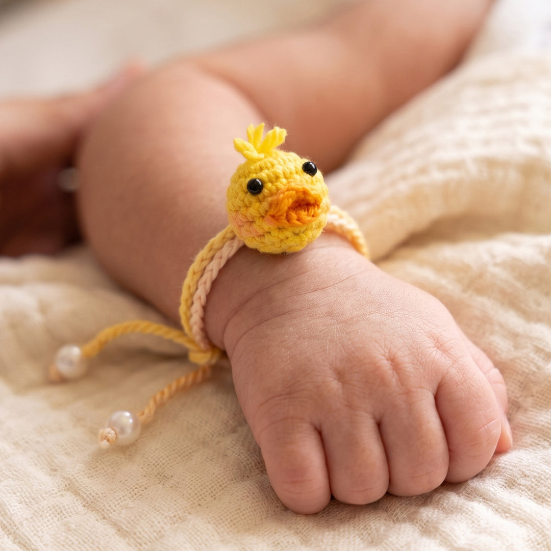Handmade Crochet Doodling Duck Rakhi For Newborns With Roli Chawal