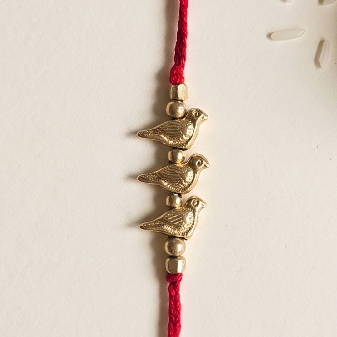 Handcrafted Brass Bird Rakhi With Roli Chawal For Sister