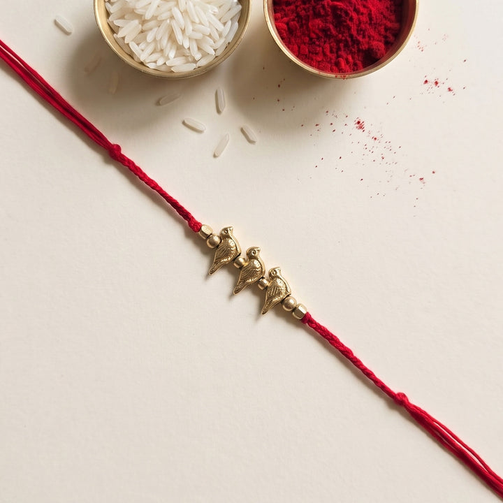 Handcrafted Brass Bird Rakhi With Roli Chawal For Sister