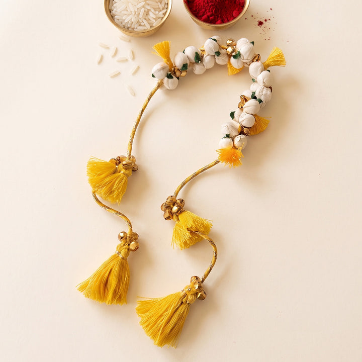 Handcrafted Shola & Ghungroo Tassel Lumba Rakhi for Bhabhi - Yellow