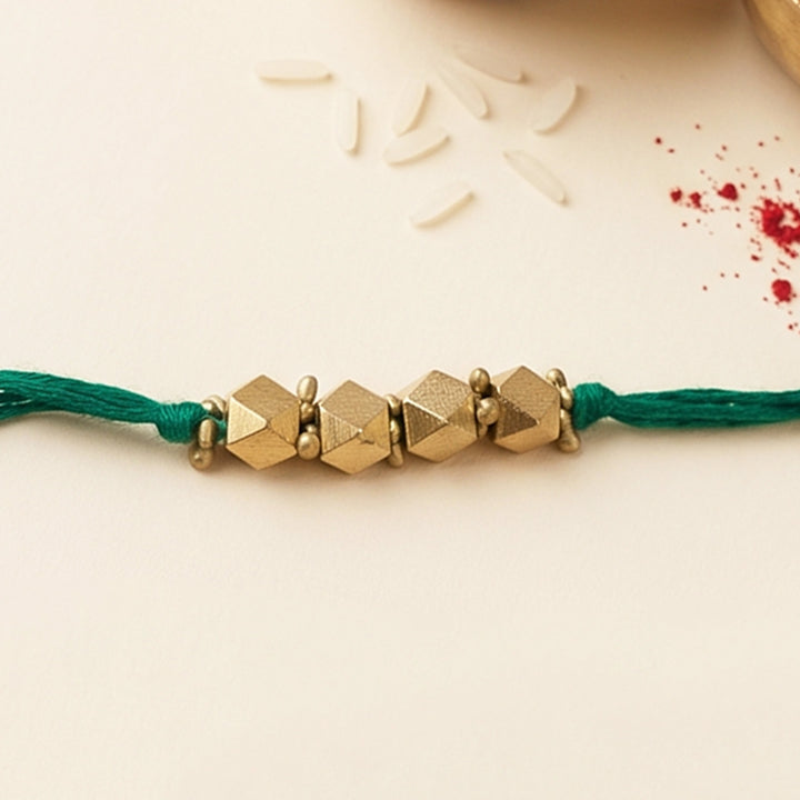 Beaded 4 Brass Beads Rakhi With Roli Chawal For Sister