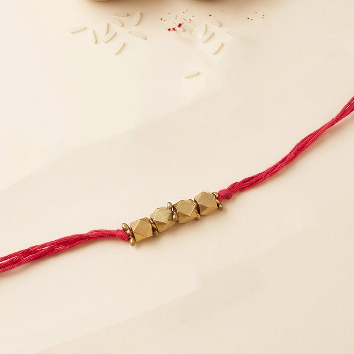 Beaded 4 Brass Beads Rakhi With Roli Chawal For Sister