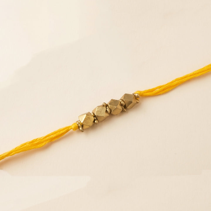 Beaded 4 Brass Beads Rakhi With Roli Chawal For Sister
