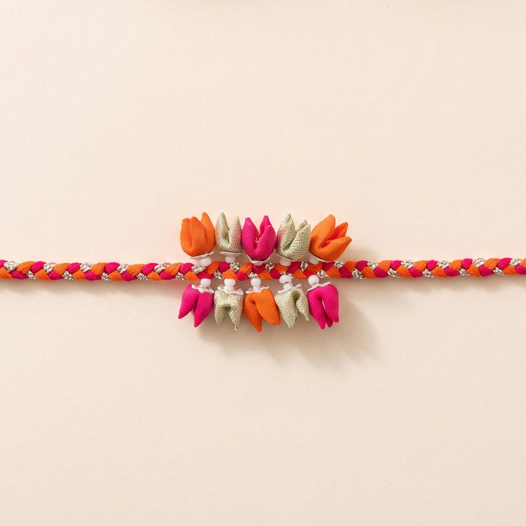 Handmade Pastel Dual-Tier Tulip Bud & Pearl Silk Fabric Rakhi For Brother With Roli Chawal