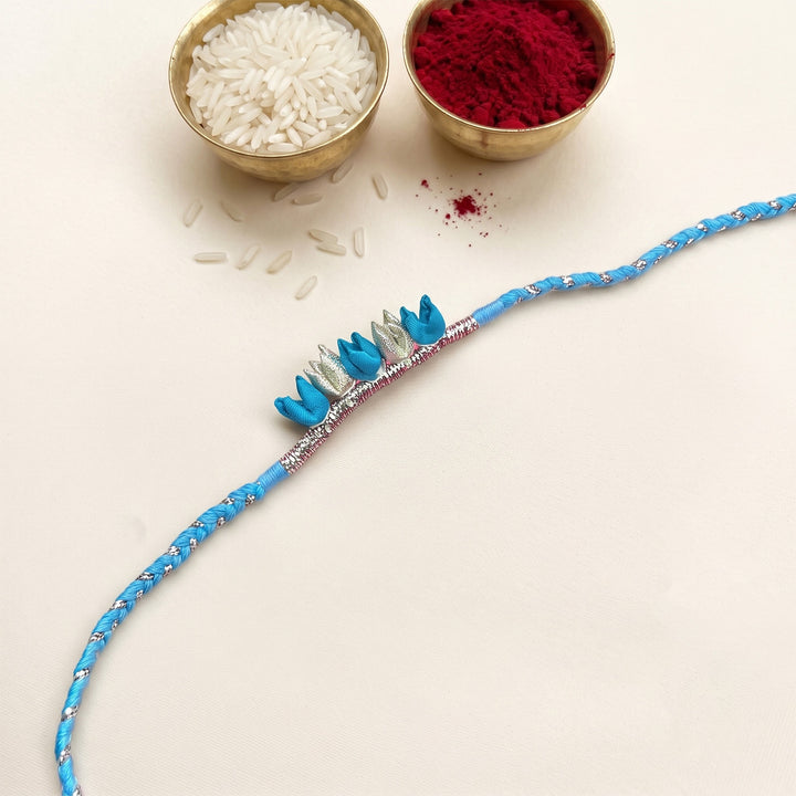 Handcrafted Tulip Bud & Silver Zari Silk Fabric Rakhi For Brother With Roli Chawal
