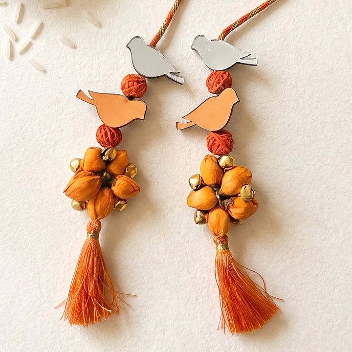 Handcrafted Bird Motif Shola Beaded Tassel Lumba Rakhi for Bhabhi - Orange