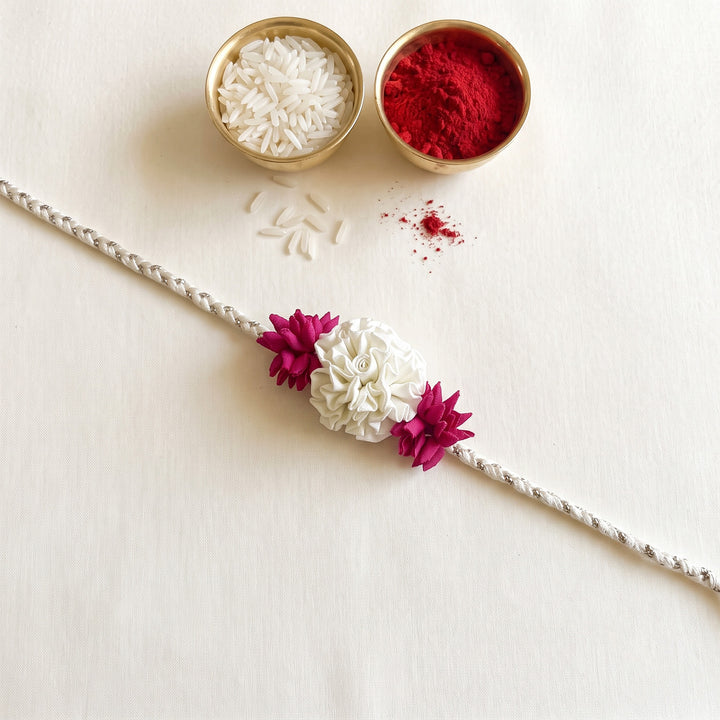 Handcrafted Rose & Mogra Bud Silk Fabric Floral Rakhi For Brother With Roli Chawal
