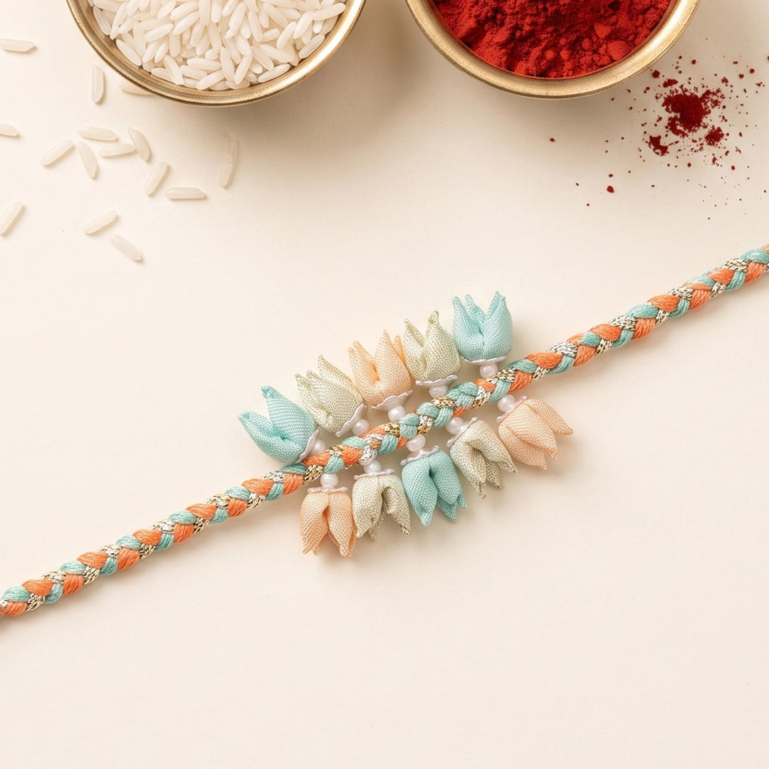 Handmade Pastel Coloured Dual-Tier Tulip Bud & Pearl Silk Rakhi For Brother With Roli Chawal