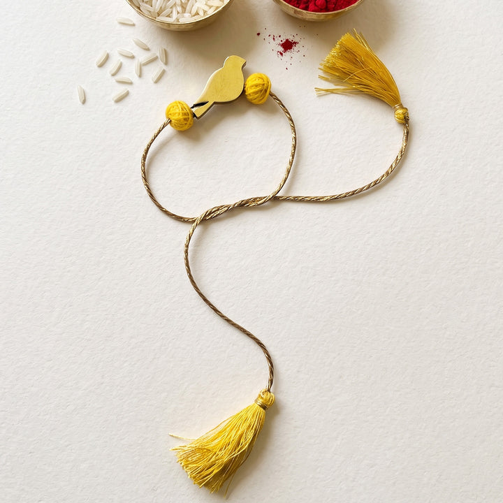Handcrafted Bird Motif Beaded Tassel Rakhi - Yellow
