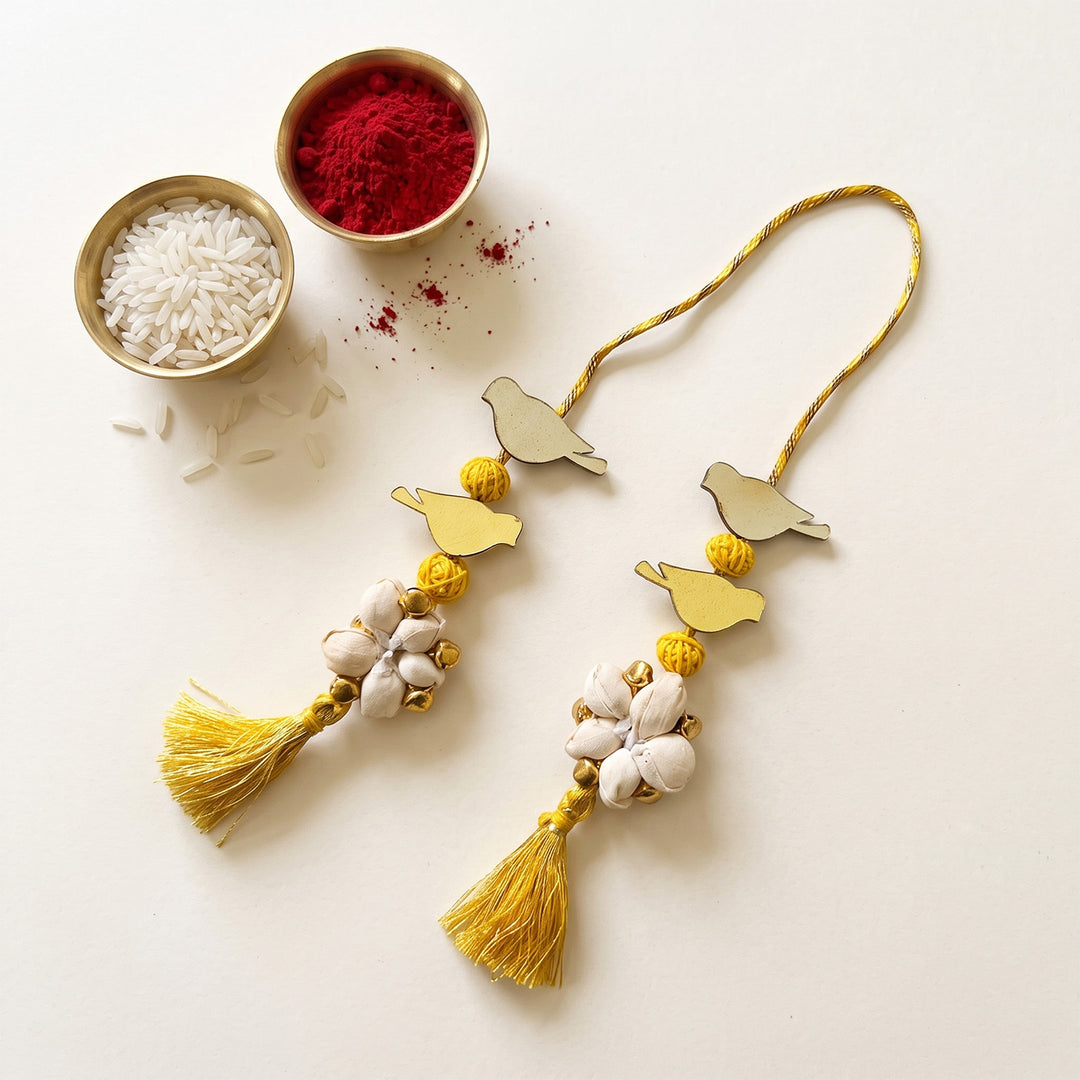 Handcrafted Bird Motif Shola Beaded Tassel Lumba Rakhi for Bhabhi - Yellow