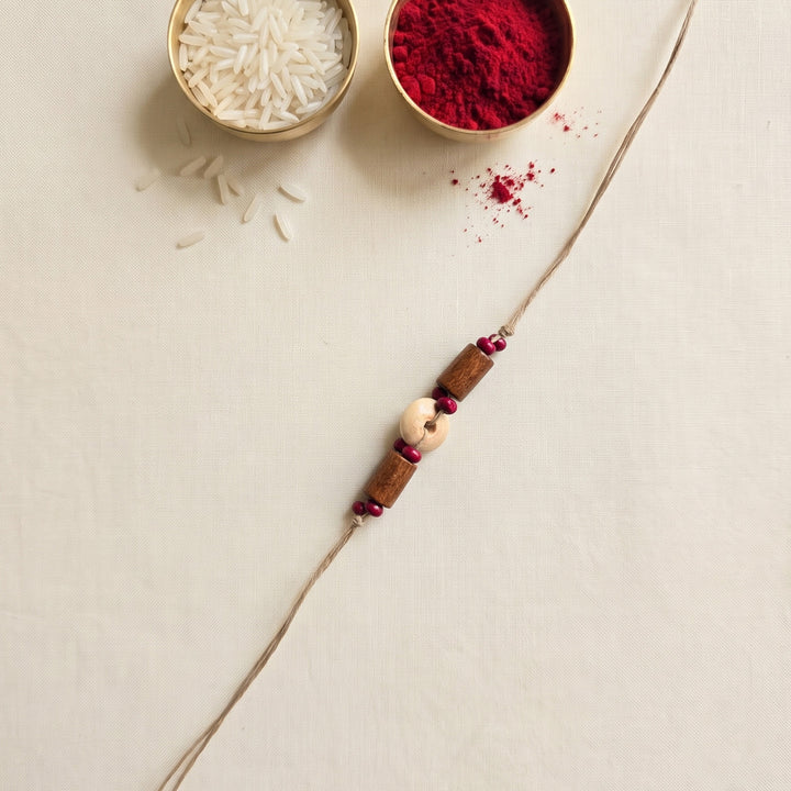 Handcrafted Jute Thread Brown & Beige Wood Bead Rakhi For Brother