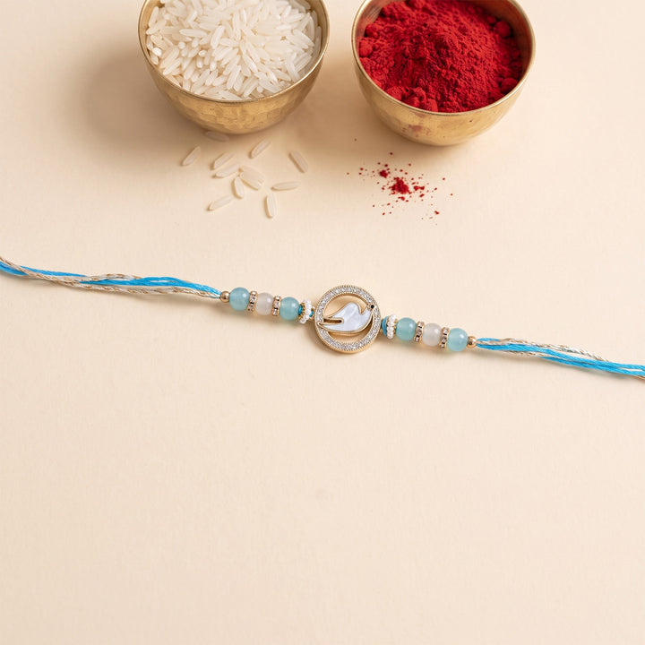 Swan Mother of Pearl Rakhi For Brother With Roli Chawal