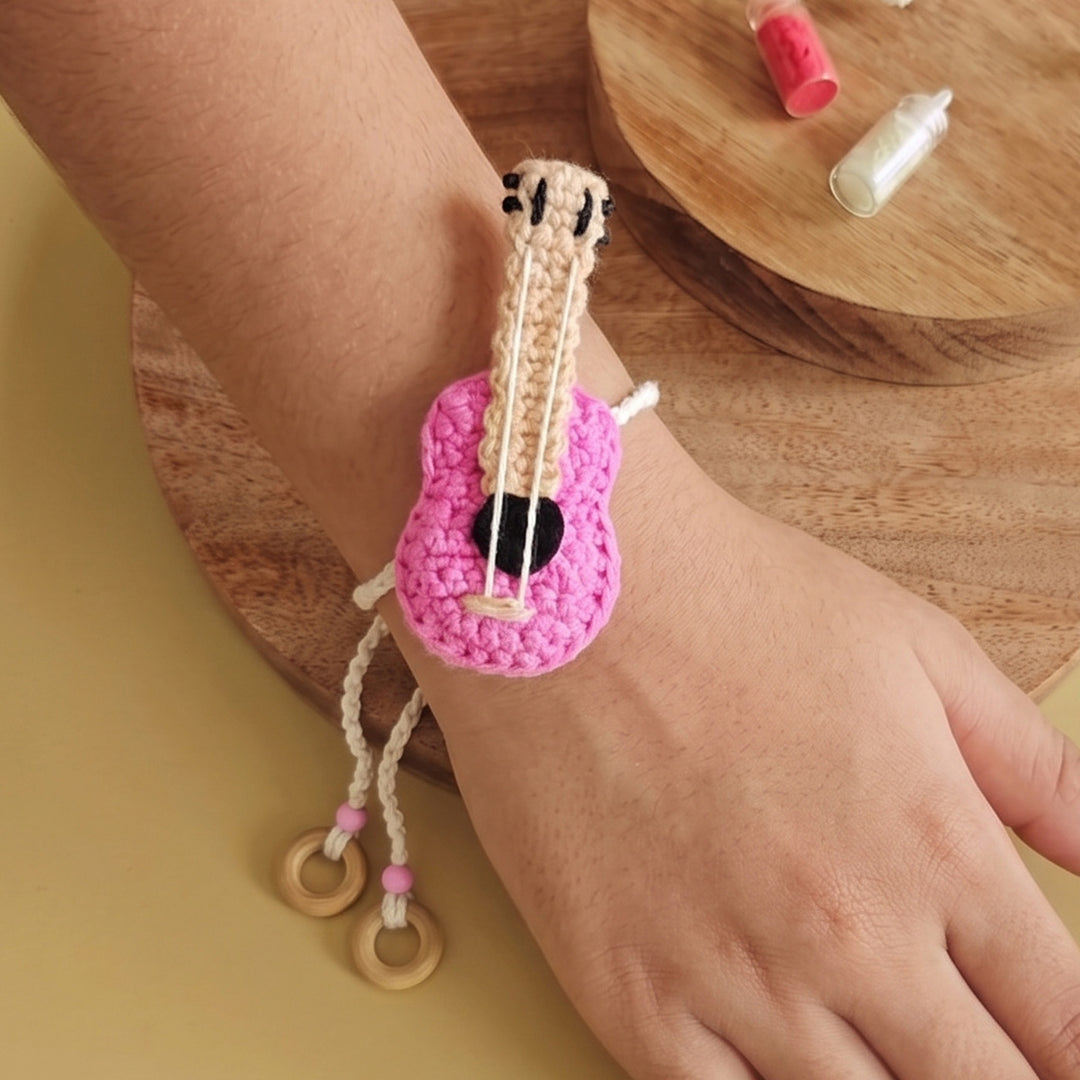 Handmade Crochet Acoustic Guitar Rakhi For Girls With Roli Chawal