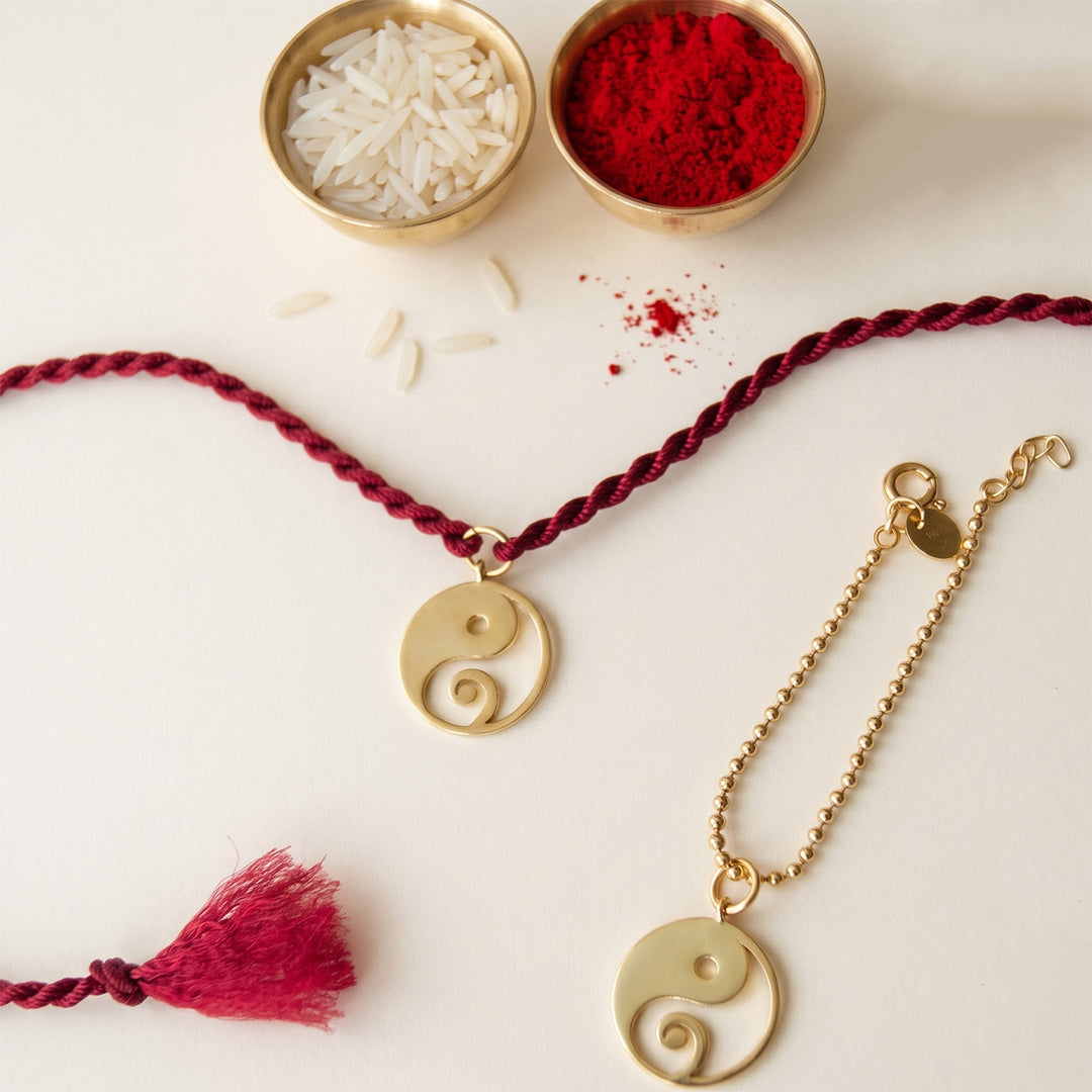 Yin And Yang With Ganesha Gold Plated Sterling Silver Rakhi & Lumba Set With Roli Chawal For Bhaiya Bhabhi | Set of 2