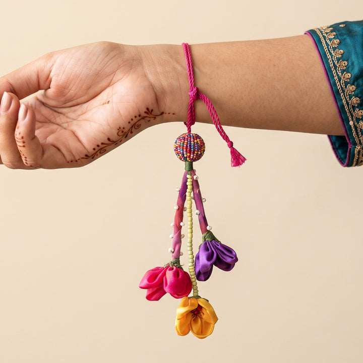 Multicoloured Fabric Flower Lumba Rakhi With Roli Chawal For Sister/Bhabhi