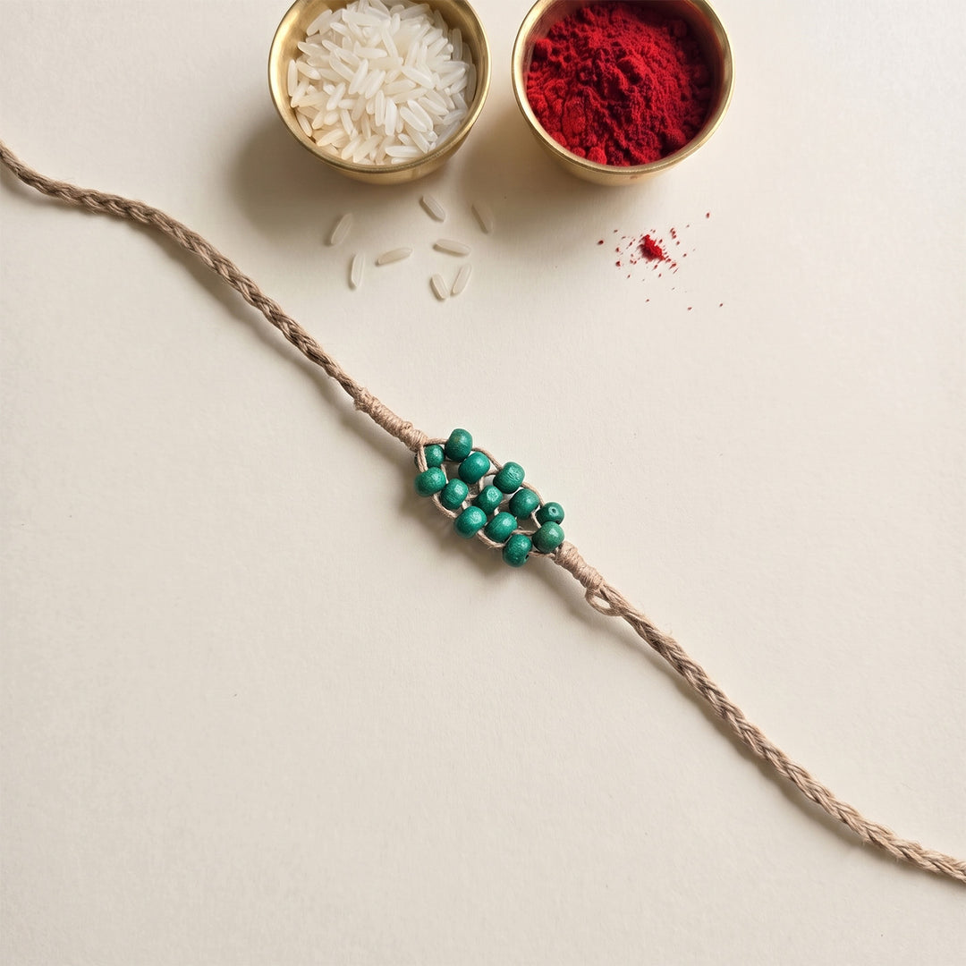 Handcrafted Jute Thread Teal Wood Bead Rakhi For Brother