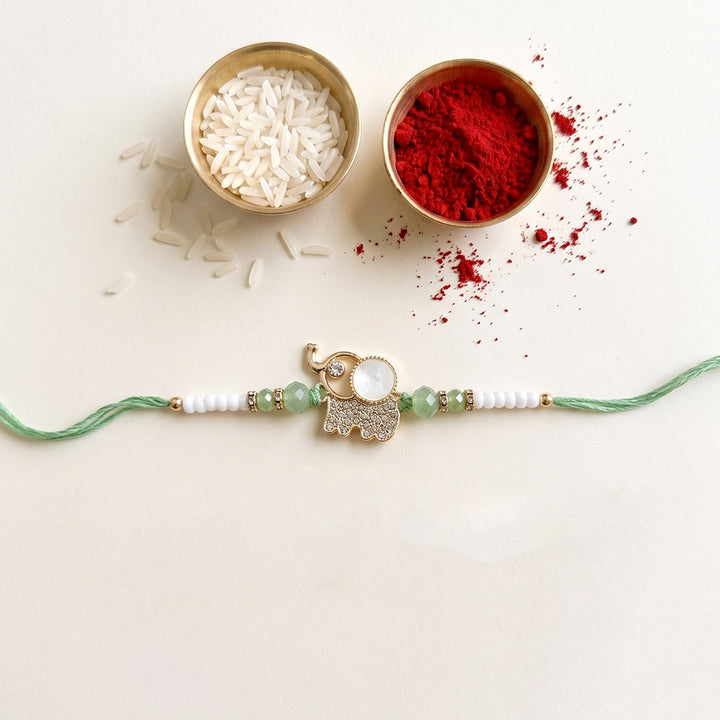 Kundan & Bead Elephant Motif Kids Rakhi With Roli Chawal