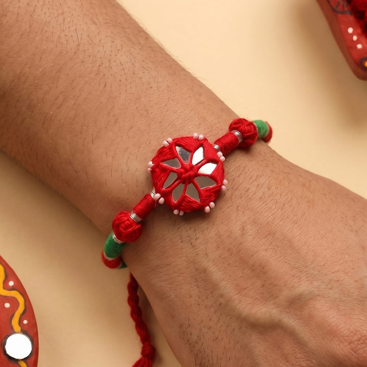 Handmade Mirror Work Patwa Maroon Cotton Rakhi With Roli Chawal