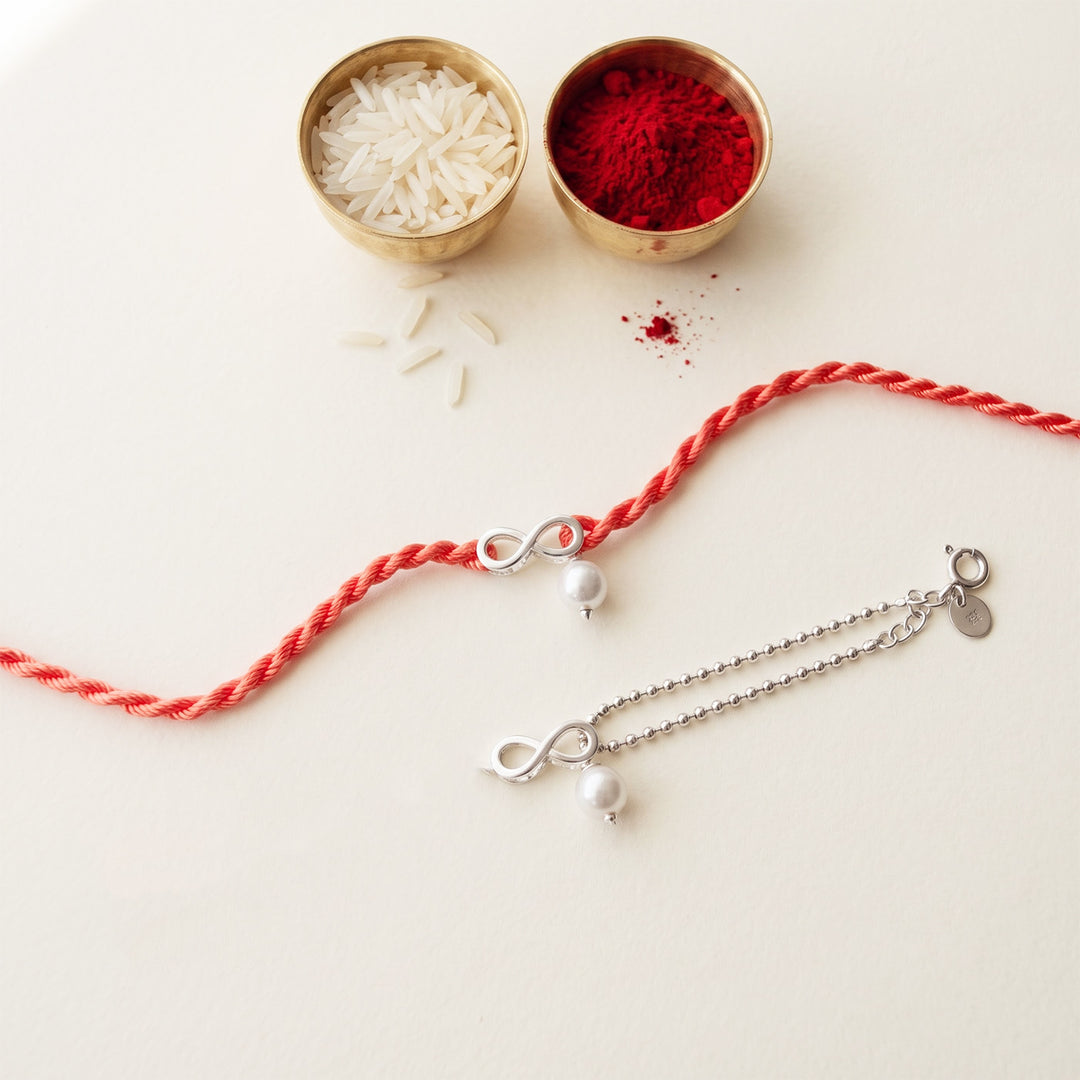 Infinity Love With Pearl Sterling Silver Rakhi & Lumba Set With Roli Chawal For Bhaiya Bhabhi | Set of 2
