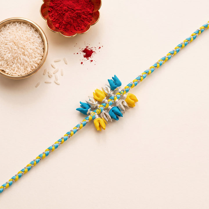Handcrafted Dual-Tier Tulip Bud & Pearl Silk Rakhi For Brother With Roli Chawal