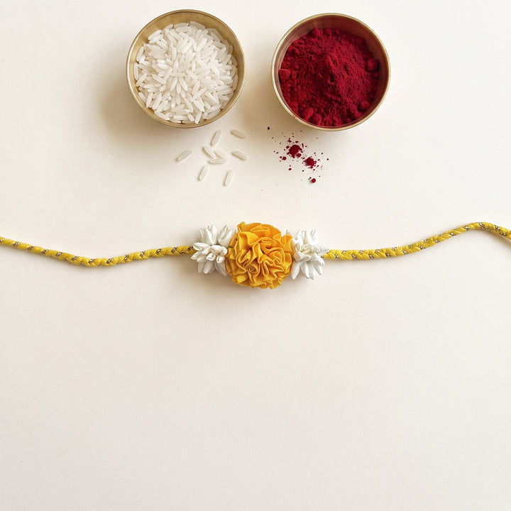 Handcrafted Rose & Mogra Bud Silk Fabric Floral Rakhi For Brother With Roli Chawal