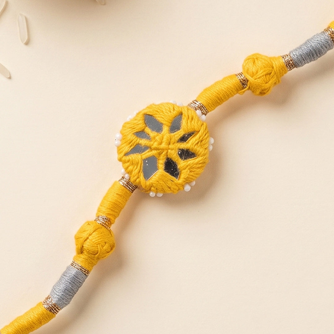 Handmade Mirror Work Patwa Yellow Cotton Rakhi With Roli Chawal