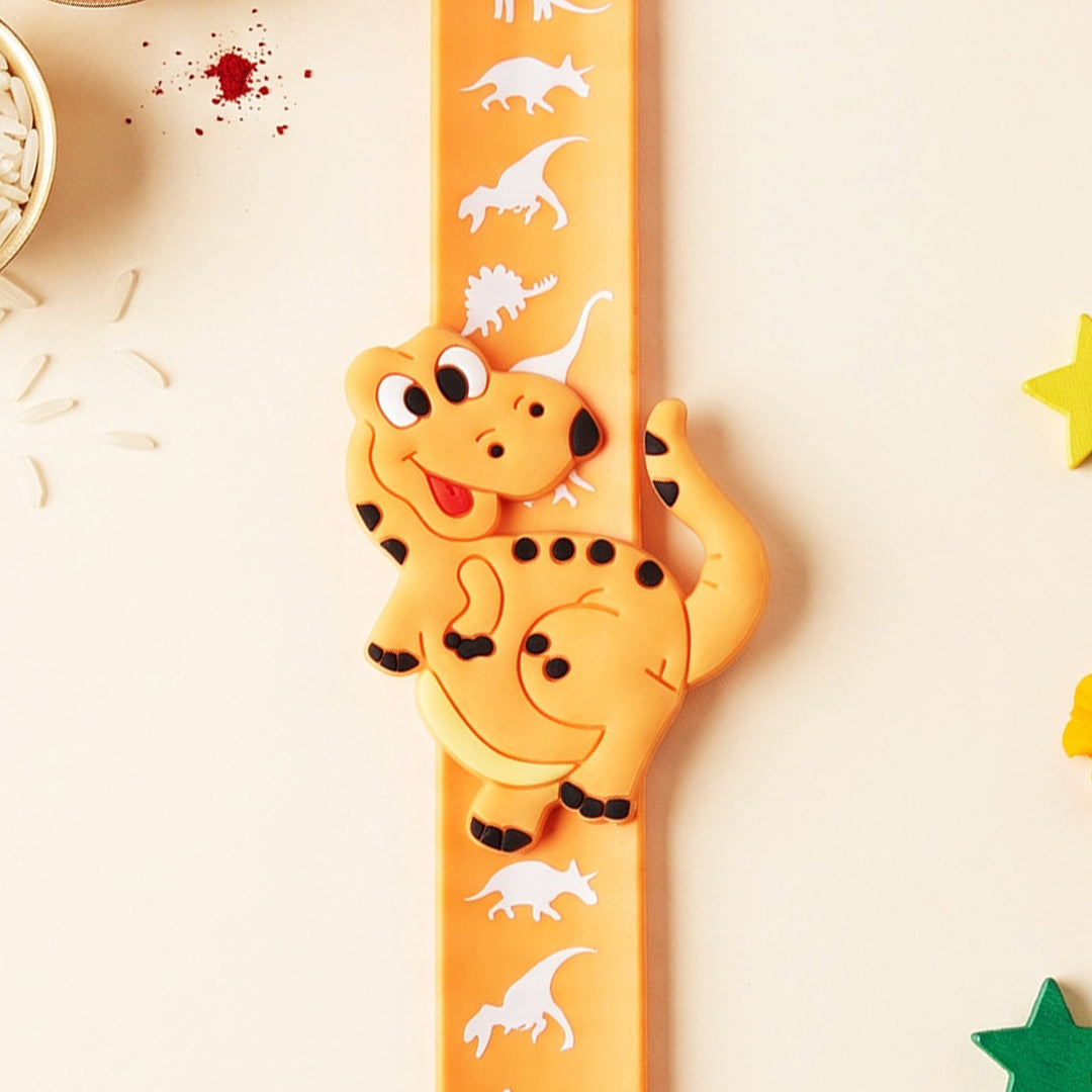 Handmade Orange Dinosaur Silicone Slap Band Rakhi For Kids With Roli Chawal For Brother